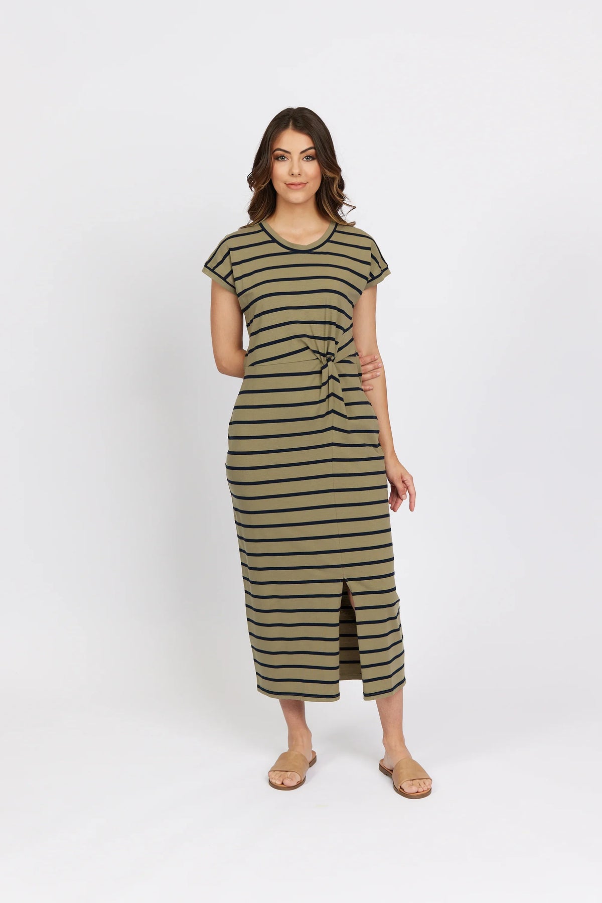 Woman wearing khaki stripe midi dress with front knot detail and short sleeves, studio background