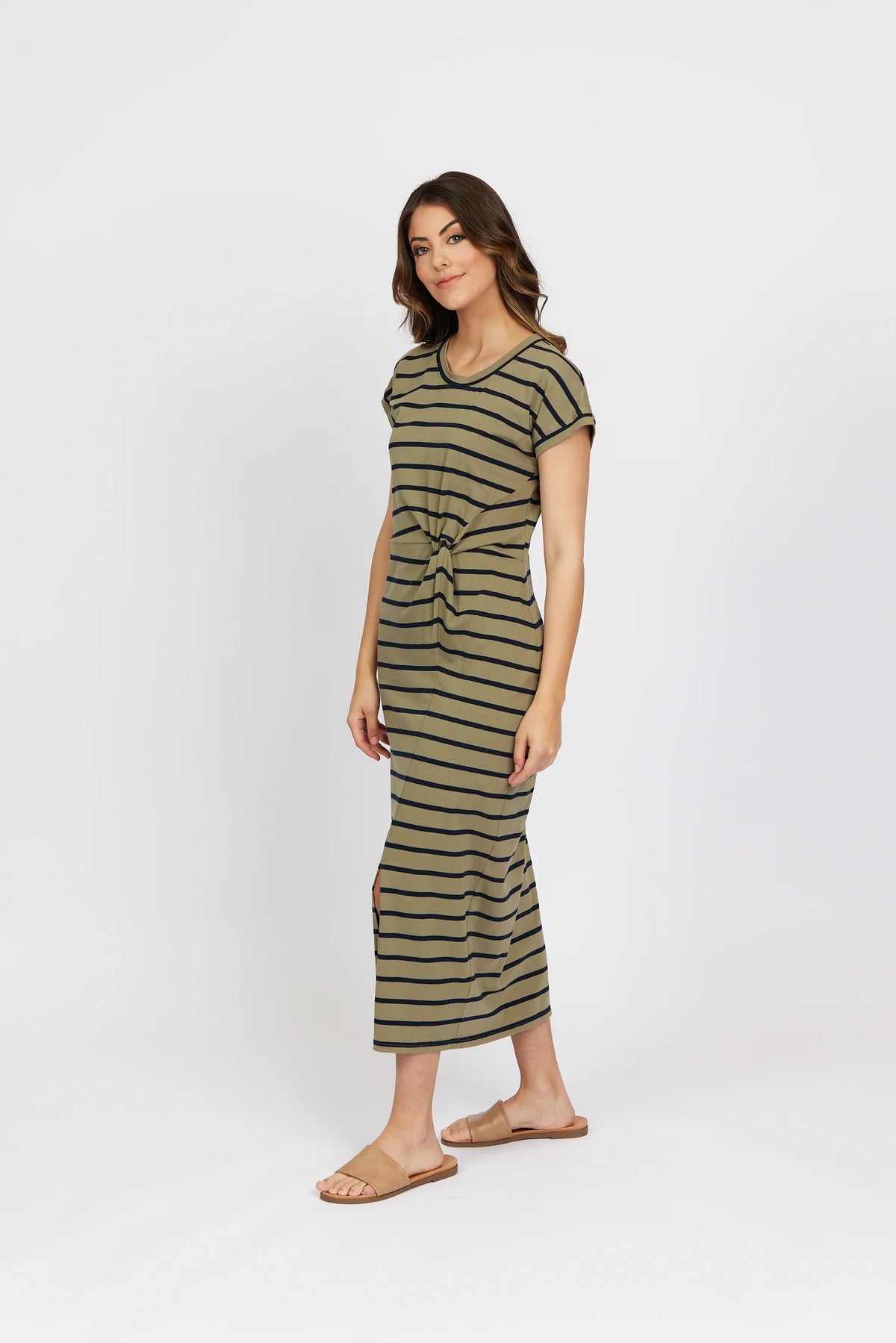 Woman wearing khaki striped midi dress with front knot and short sleeves, casual style