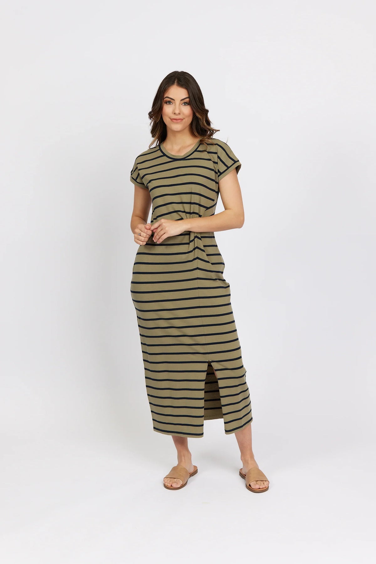 Woman wearing khaki striped midi dress with short sleeves and front slit, casual style