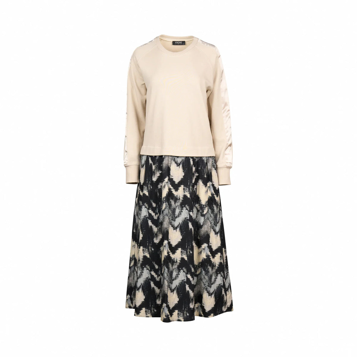 Long sleeve beige top with an abstract black and cream patterned midi skirt dress