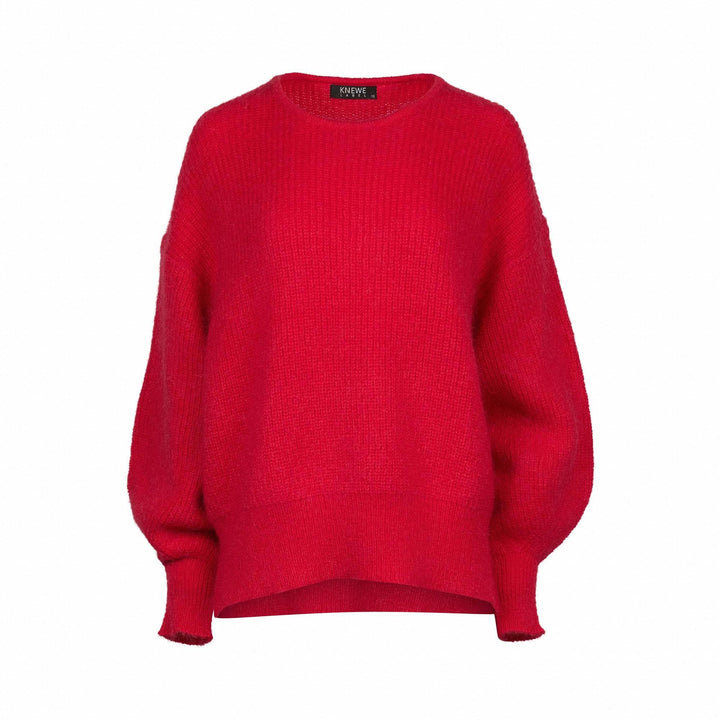 Women's oversized red knit sweater with drop shoulders on white background
