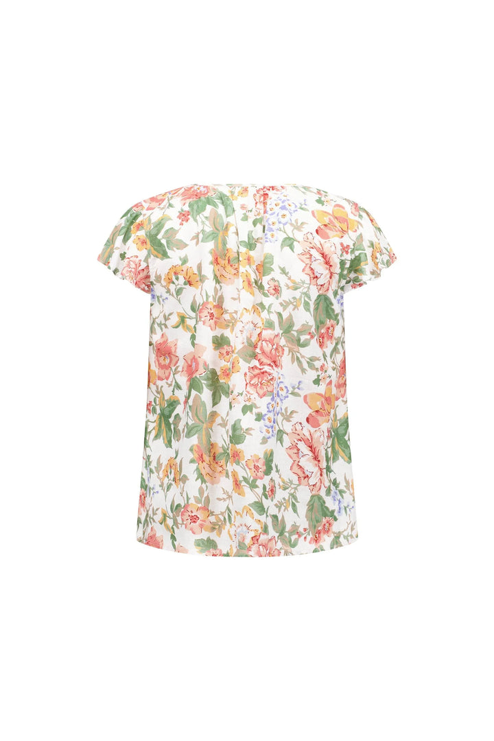 Back view of a short sleeve floral top with a loose fit and colorful flower print