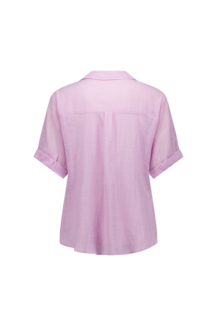 Back view of the Knewe Label Infinity Shirt - Lilac, crafted from lightweight cotton with a relaxed fit, button-up front, classic collar, and folded sleeve cuffs for easy style.