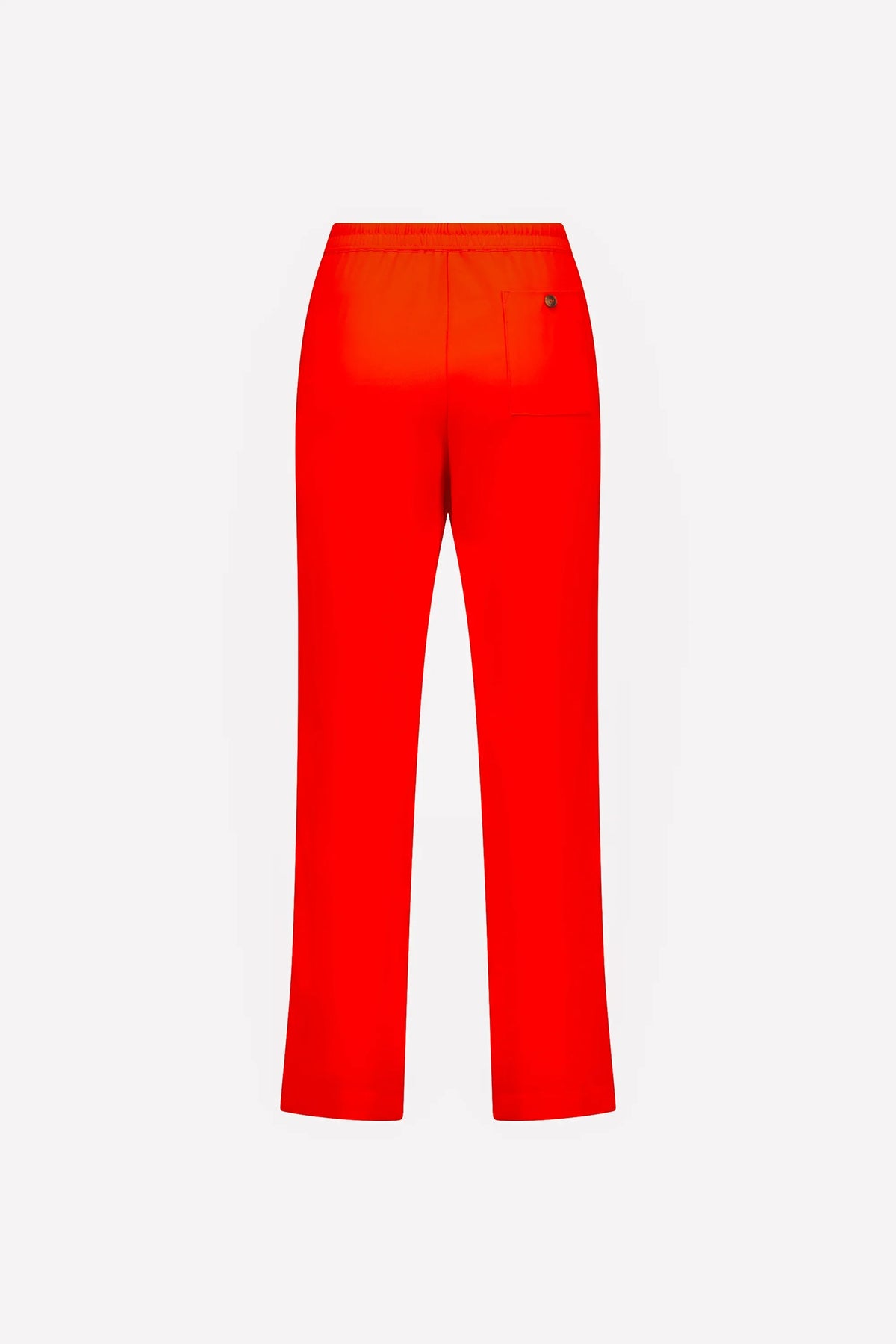 Back view of straight-leg blood orange pants with elastic waist and single back pocket