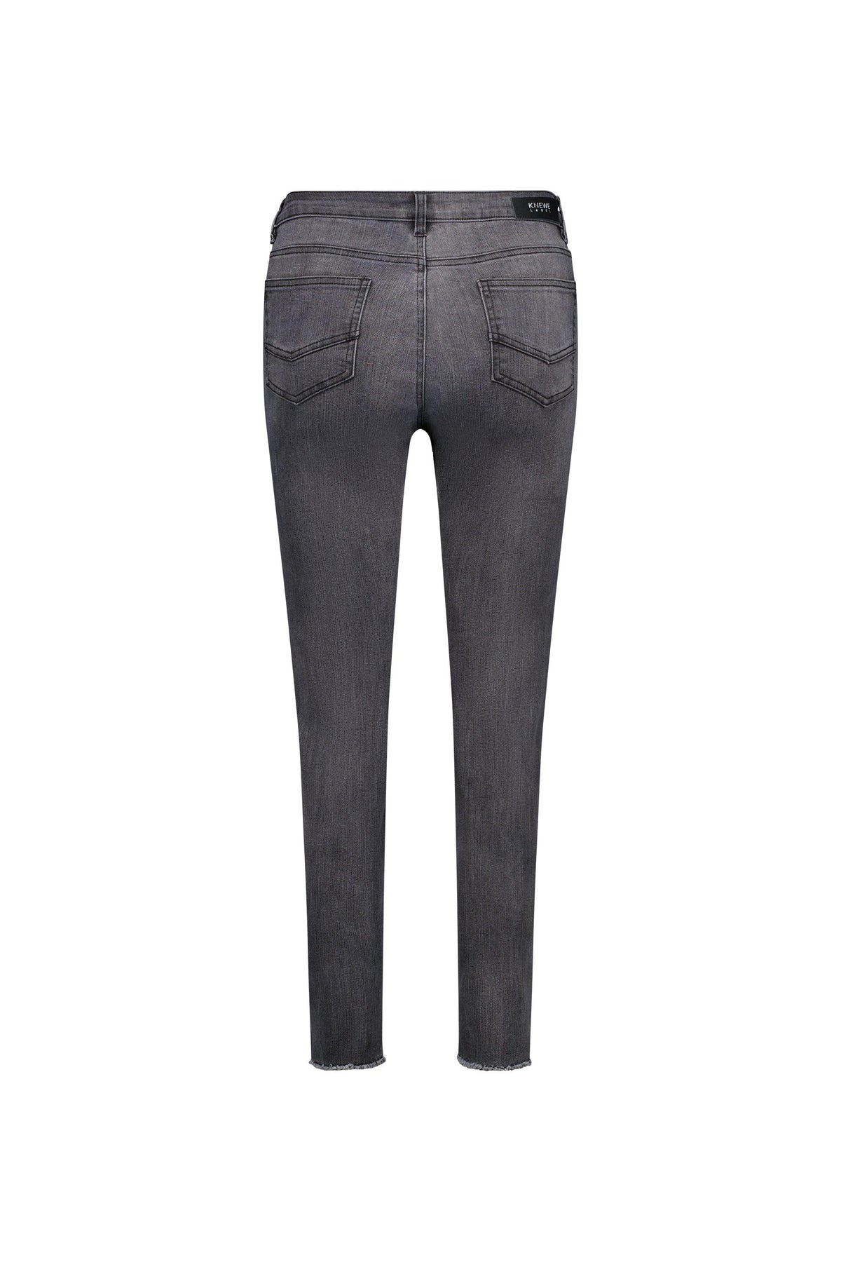 Back view of space grey skinny jeans with two rear pockets and raw hem on white background