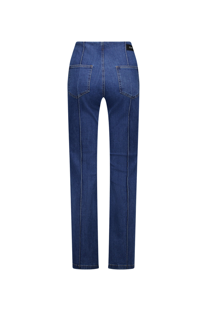 The Knewe Label Haze Jean - Indigo is shown from the back, featuring two large back pockets, visible seams, and a straight-leg cut in stretch denim against a white background.