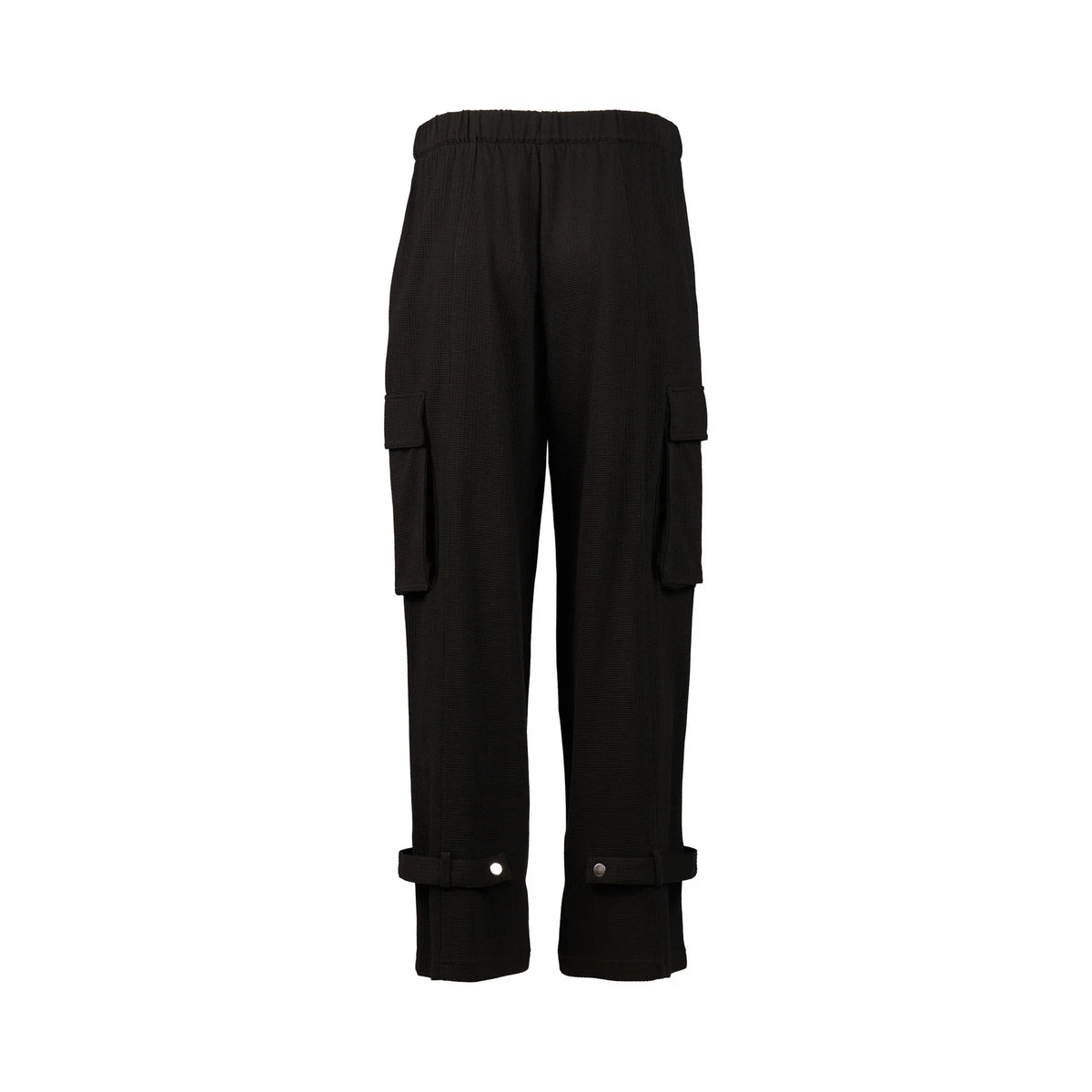 Black cargo pants with flap pockets and buttoned cuffs, back view on white background