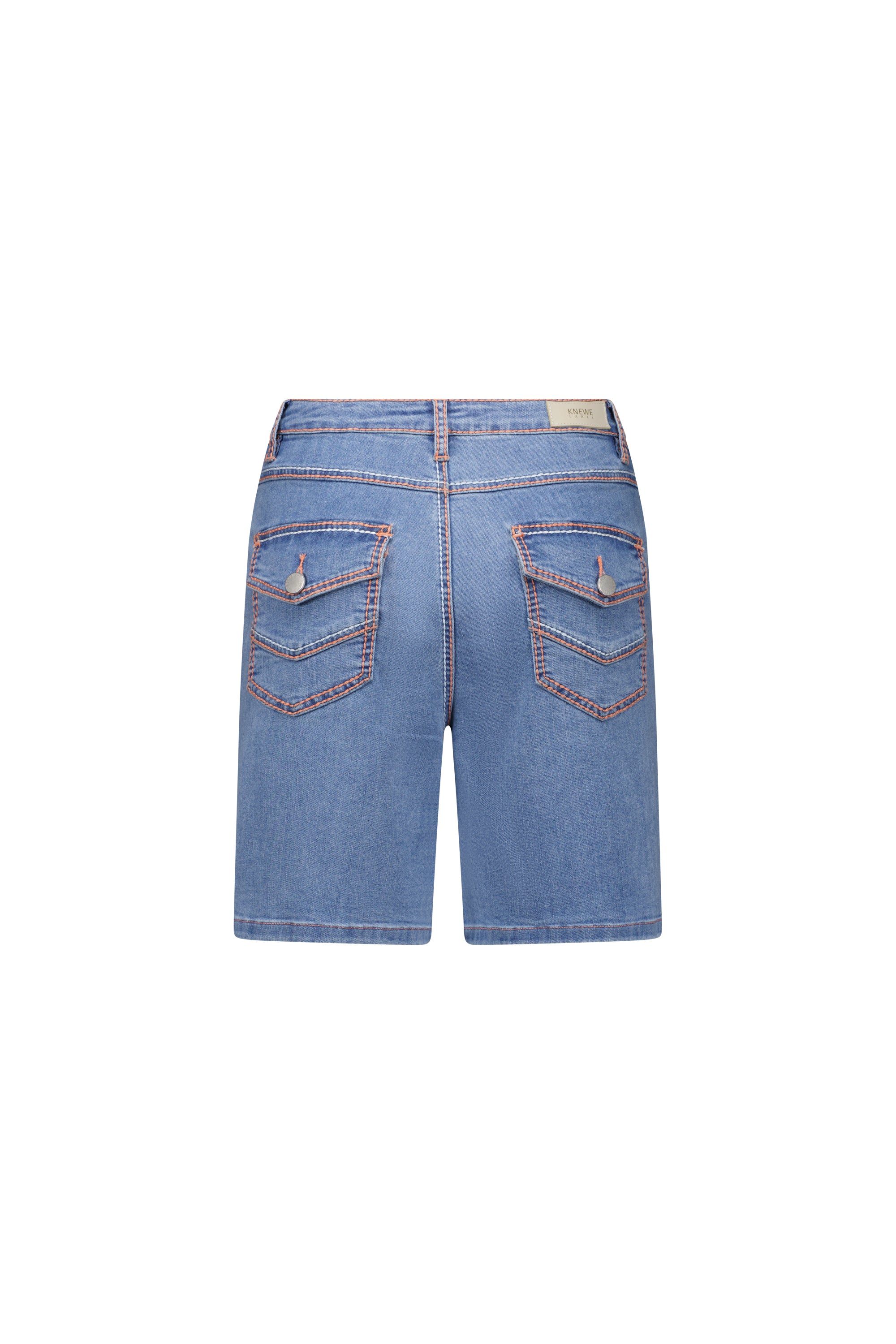 Flat lay back view of the Knewe Label Switch Short in palm blue stretch denim, showing the two flap back pockets with metal button closures, contrast stitching and leather KNEWE brand patch on the waistband.