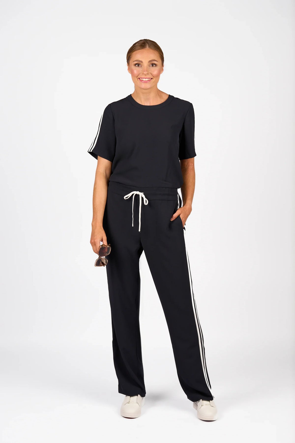 KNEWE Label women's K1049 Universal Jumpsuit Ink Off in White - close-up fabric detail